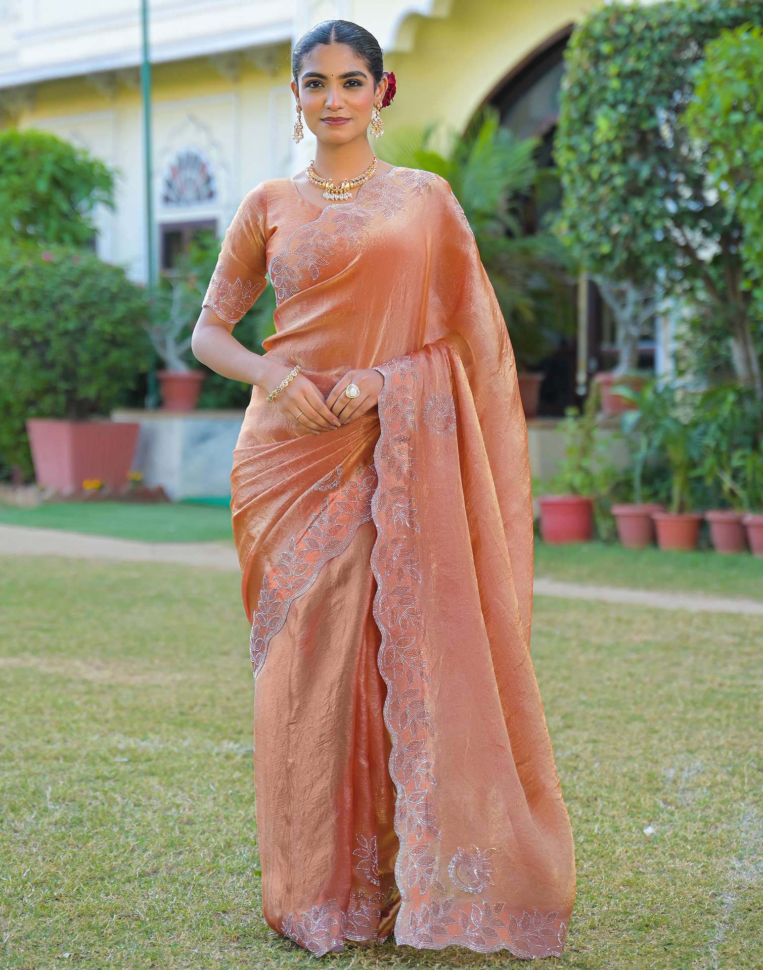 Peach Shimmer Stone Work Embellished Saree