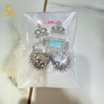 Heritage Royal Oxidized Silver Jhumka Earrings with Aqua Stone, Hand-Carved Motifs, White Crystal Embellishments & Pearl Drop Finish. - Image 5