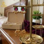 Royal Kashmiri-Inspired Gold-Plated Ear Cuff Chain Earrings with Ruby Pink & Emerald Green Stones, Dual Chain Ghungroo Drops & Antique Finish. - Image 3