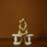 Golden Couple Sitting on Bench Showpiece for Home Decor & Romantic Gifting - Image 3