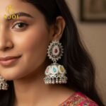 Royal Silver-Tone Kundan Jhumka Earrings with Multicolor Stone Inlay & Pearl Drop Detailing - Image 2