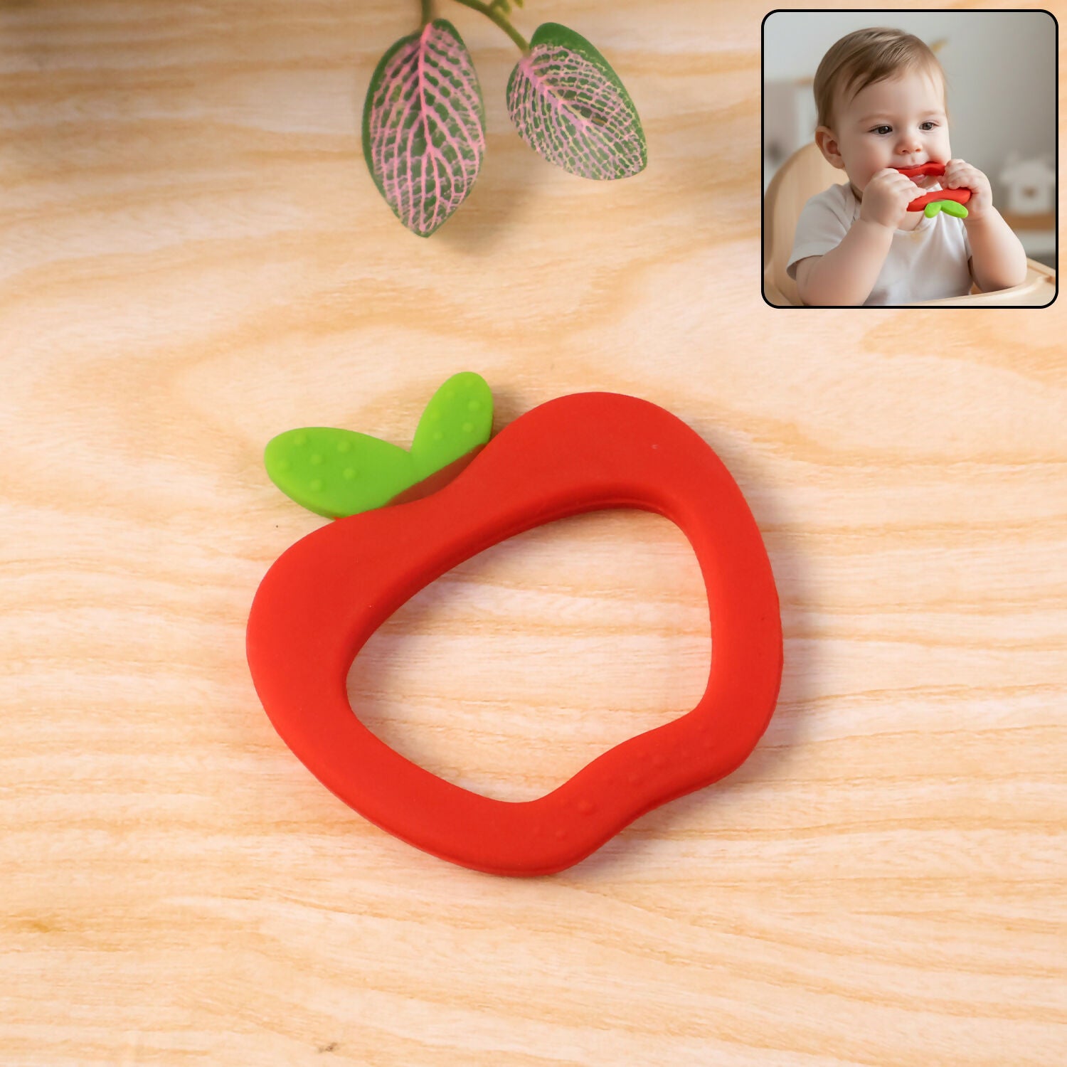 w3iI7Ww5tM.jpg Apple shaped silicone baby teether - Image 1