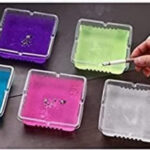 DISPOSABLE SMOKELESS CIGARETTE ASHTRAY INCLUDING SAND CLEANER