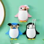 PENGUIN SHAPE WALL MOUNTED TOOTHPASTE HOLDER